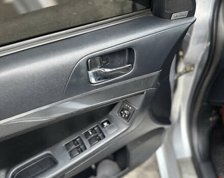 Сірий Міцубісі Lancer, об'ємом двигуна 2 л та пробігом 104 тис. км за 5999 $, фото 7 на Automoto.ua