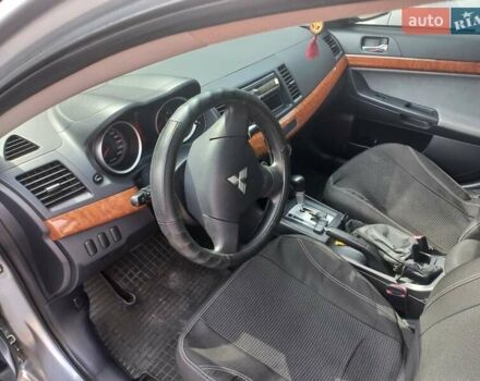 Серый Мицубиси Лансер, объемом двигателя 2 л и пробегом 103 тыс. км за 7700 $, фото 14 на Automoto.ua