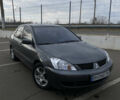 Сірий Міцубісі Lancer, об'ємом двигуна 1.58 л та пробігом 293 тис. км за 4350 $, фото 1 на Automoto.ua