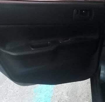 Сірий Міцубісі Lancer, об'ємом двигуна 1.58 л та пробігом 323 тис. км за 3300 $, фото 8 на Automoto.ua