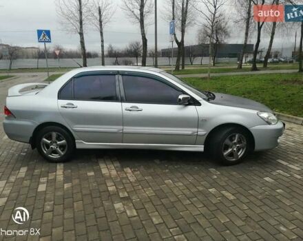 Сірий Міцубісі Lancer, об'ємом двигуна 1.6 л та пробігом 225 тис. км за 5200 $, фото 5 на Automoto.ua