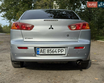 Серый Мицубиси Лансер, объемом двигателя 2 л и пробегом 175 тыс. км за 7300 $, фото 5 на Automoto.ua