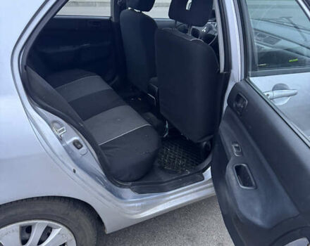 Серый Мицубиси Лансер, объемом двигателя 1.58 л и пробегом 330 тыс. км за 3500 $, фото 12 на Automoto.ua