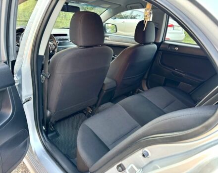 Серый Мицубиси Лансер, объемом двигателя 2 л и пробегом 223 тыс. км за 6890 $, фото 13 на Automoto.ua