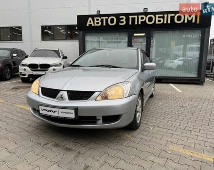 Сірий Міцубісі Lancer, об'ємом двигуна 1.6 л та пробігом 206 тис. км за 4799 $, фото 1 на Automoto.ua