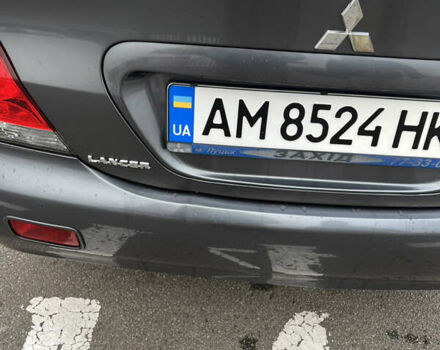 Серый Мицубиси Лансер, объемом двигателя 1.58 л и пробегом 183 тыс. км за 3800 $, фото 15 на Automoto.ua