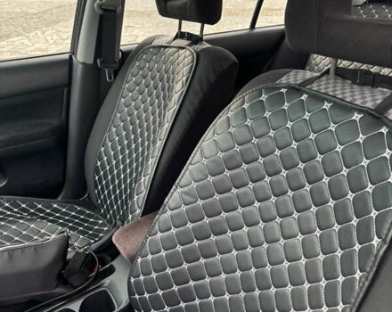 Серый Мицубиси Лансер, объемом двигателя 1.6 л и пробегом 222 тыс. км за 5200 $, фото 13 на Automoto.ua