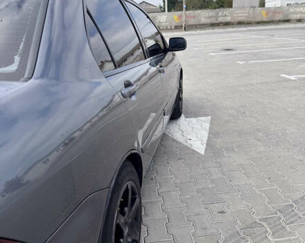 Серый Мицубиси Лансер, объемом двигателя 1.58 л и пробегом 250 тыс. км за 4300 $, фото 12 на Automoto.ua