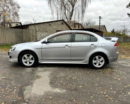 Серый Мицубиси Лансер, объемом двигателя 2 л и пробегом 225 тыс. км за 6890 $, фото 3 на Automoto.ua