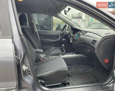 Серый Мицубиси Лансер, объемом двигателя 1.58 л и пробегом 146 тыс. км за 5490 $, фото 11 на Automoto.ua