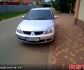 Сірий Міцубісі Lancer, об'ємом двигуна 1.6 л та пробігом 193 тис. км за 4999 $, фото 1 на Automoto.ua