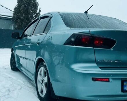 Сірий Міцубісі Lancer, об'ємом двигуна 2 л та пробігом 213 тис. км за 7300 $, фото 2 на Automoto.ua