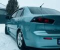 Сірий Міцубісі Lancer, об'ємом двигуна 2 л та пробігом 213 тис. км за 7300 $, фото 2 на Automoto.ua