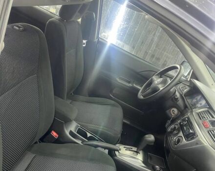 Серый Мицубиси Лансер, объемом двигателя 1.6 л и пробегом 100 тыс. км за 2500 $, фото 6 на Automoto.ua