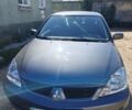 Сірий Міцубісі Lancer, об'ємом двигуна 1.6 л та пробігом 365 тис. км за 4900 $, фото 1 на Automoto.ua