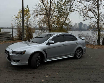 Сірий Міцубісі Lancer, об'ємом двигуна 2 л та пробігом 253 тис. км за 8700 $, фото 4 на Automoto.ua