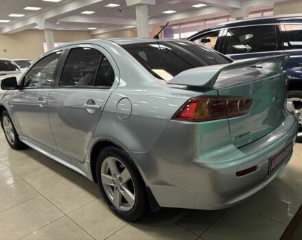 Серый Мицубиси Лансер, объемом двигателя 1.5 л и пробегом 241 тыс. км за 6400 $, фото 1 на Automoto.ua