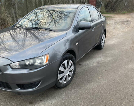 Серый Мицубиси Лансер, объемом двигателя 1.5 л и пробегом 255 тыс. км за 6500 $, фото 7 на Automoto.ua