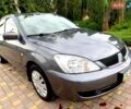 Сірий Міцубісі Lancer, об'ємом двигуна 1.6 л та пробігом 23 тис. км за 8333 $, фото 1 на Automoto.ua