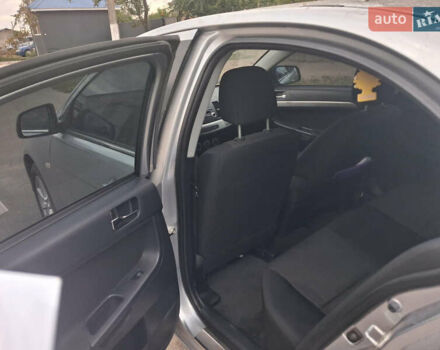 Сірий Міцубісі Lancer, об'ємом двигуна 1.8 л та пробігом 255 тис. км за 6999 $, фото 8 на Automoto.ua