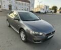 Сірий Міцубісі Lancer, об'ємом двигуна 2 л та пробігом 219 тис. км за 6700 $, фото 2 на Automoto.ua