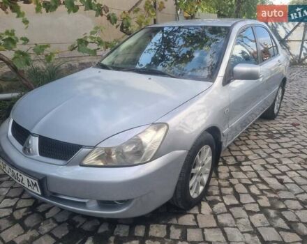Сірий Міцубісі Lancer, об'ємом двигуна 1.6 л та пробігом 290 тис. км за 3850 $, фото 13 на Automoto.ua