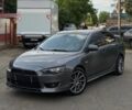 Серый Мицубиси Лансер, объемом двигателя 2 л и пробегом 270 тыс. км за 5500 $, фото 1 на Automoto.ua