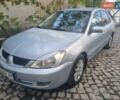 Сірий Міцубісі Lancer, об'ємом двигуна 1.6 л та пробігом 290 тис. км за 3850 $, фото 13 на Automoto.ua