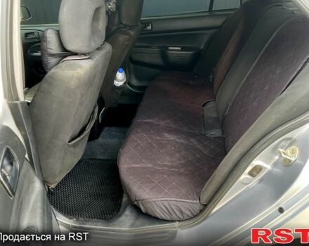 Сірий Міцубісі Lancer, об'ємом двигуна 1.6 л та пробігом 193 тис. км за 4500 $, фото 9 на Automoto.ua