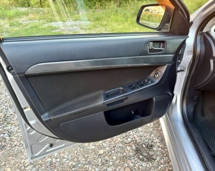 Серый Мицубиси Лансер, объемом двигателя 2 л и пробегом 223 тыс. км за 6890 $, фото 11 на Automoto.ua