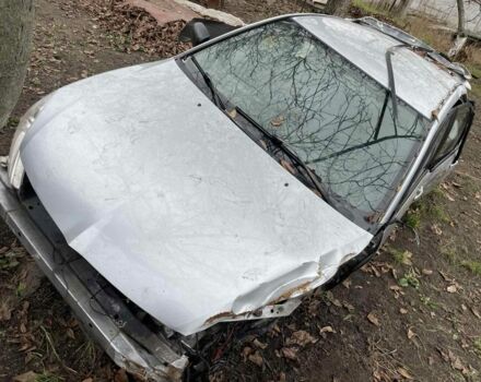 Серый Мицубиси Лансер, объемом двигателя 1.6 л и пробегом 280 тыс. км за 900 $, фото 1 на Automoto.ua