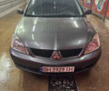 Серый Мицубиси Лансер, объемом двигателя 1.6 л и пробегом 268 тыс. км за 4600 $, фото 3 на Automoto.ua
