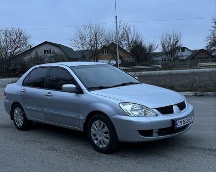 Сірий Міцубісі Lancer, об'ємом двигуна 1.6 л та пробігом 180 тис. км за 3900 $, фото 1 на Automoto.ua