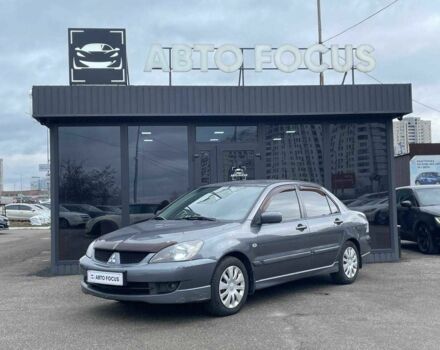 Серый Мицубиси Лансер, объемом двигателя 1.6 л и пробегом 146 тыс. км за 5990 $, фото 3 на Automoto.ua