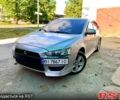 Серый Мицубиси Лансер, объемом двигателя 2 л и пробегом 175 тыс. км за 6800 $, фото 1 на Automoto.ua