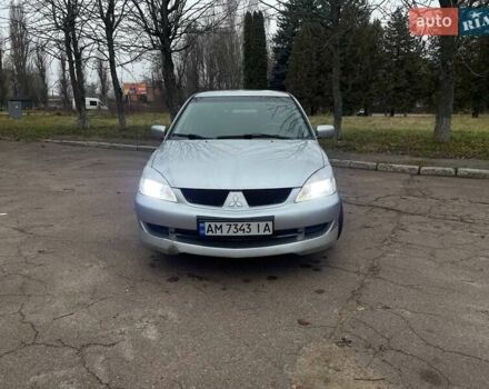 Сірий Міцубісі Lancer, об'ємом двигуна 1.6 л та пробігом 254 тис. км за 3800 $, фото 1 на Automoto.ua