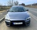 Серый Мицубиси Лансер, объемом двигателя 2 л и пробегом 280 тыс. км за 4650 $, фото 1 на Automoto.ua