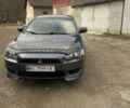 Сірий Міцубісі Lancer, об'ємом двигуна 2 л та пробігом 220 тис. км за 5750 $, фото 6 на Automoto.ua
