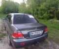 Сірий Міцубісі Lancer, об'ємом двигуна 0.16 л та пробігом 146 тис. км за 5500 $, фото 4 на Automoto.ua