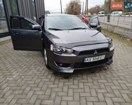 Міцубісі Lancer 2008 у Хмельницькому на Automoto.ua Сірий Міцубісі Lancer, об'ємом двигуна 2 л та пробігом 157 тис. км за 6300 $, фото 30 на Automoto.ua