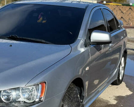 Серый Мицубиси Лансер, объемом двигателя 2 л и пробегом 190 тыс. км за 6900 $, фото 9 на Automoto.ua