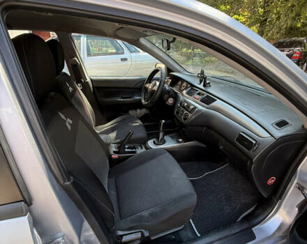 Сірий Міцубісі Lancer, об'ємом двигуна 1.6 л та пробігом 255 тис. км за 4100 $, фото 4 на Automoto.ua
