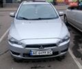 Серый Мицубиси Лансер, объемом двигателя 2 л и пробегом 312 тыс. км за 5500 $, фото 1 на Automoto.ua