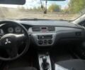 Серый Мицубиси Лансер, объемом двигателя 1.6 л и пробегом 195 тыс. км за 4600 $, фото 4 на Automoto.ua