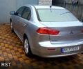 Серый Мицубиси Лансер, объемом двигателя 2 л и пробегом 149 тыс. км за 6800 $, фото 1 на Automoto.ua