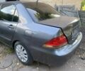 Серый Мицубиси Лансер, объемом двигателя 1.6 л и пробегом 170 тыс. км за 900 $, фото 7 на Automoto.ua