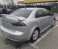 Серый Мицубиси Лансер, объемом двигателя 2 л и пробегом 220 тыс. км за 5700 $, фото 1 на Automoto.ua