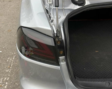 Сірий Міцубісі Lancer, об'ємом двигуна 2 л та пробігом 253 тис. км за 8700 $, фото 21 на Automoto.ua