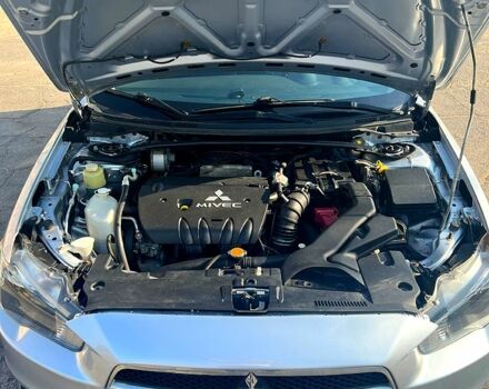 Серый Мицубиси Лансер, объемом двигателя 2 л и пробегом 151 тыс. км за 6099 $, фото 7 на Automoto.ua