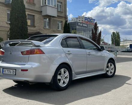 Серый Мицубиси Лансер, объемом двигателя 2 л и пробегом 265 тыс. км за 5500 $, фото 4 на Automoto.ua
